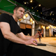 Director and animator Travis Knight working with Kubo on the Sun Village set at Laika. Image: Steven Wong Jr., Laika Studios / Universal Pictures
